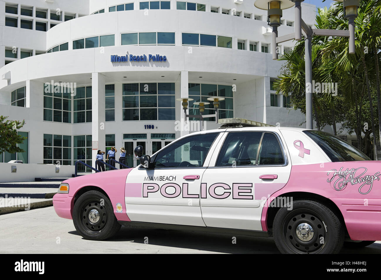Pink-coloured police vehicle Miami Beach policy, Miami Beach policy court, Washington avenue, Miami South Beach, kind of Deco District, Florida, USA, Stock Photo