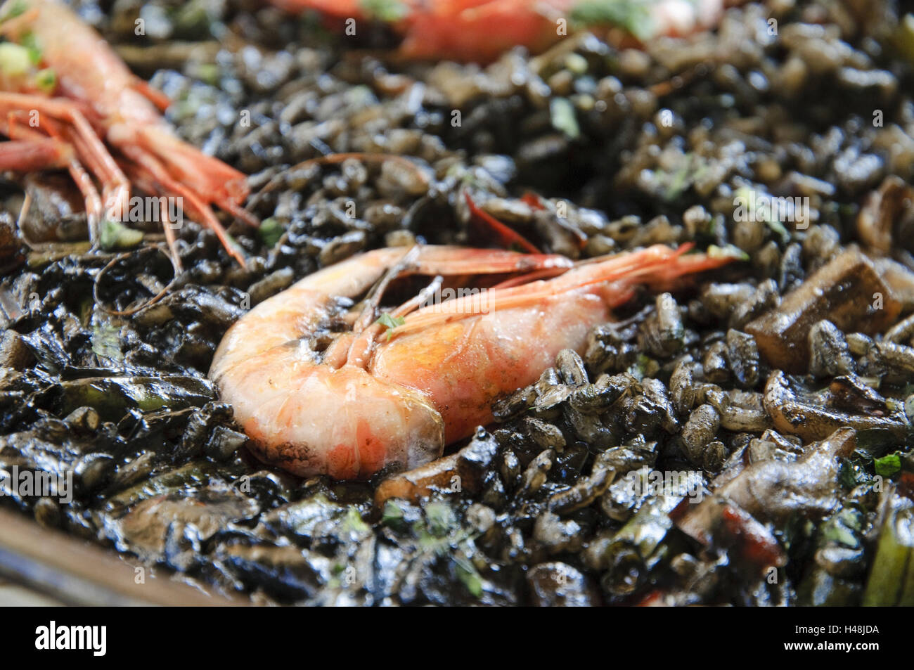 Negra Black Rice Paella Negra, black rice frying pan with crabs, Calamar and vegetables ...