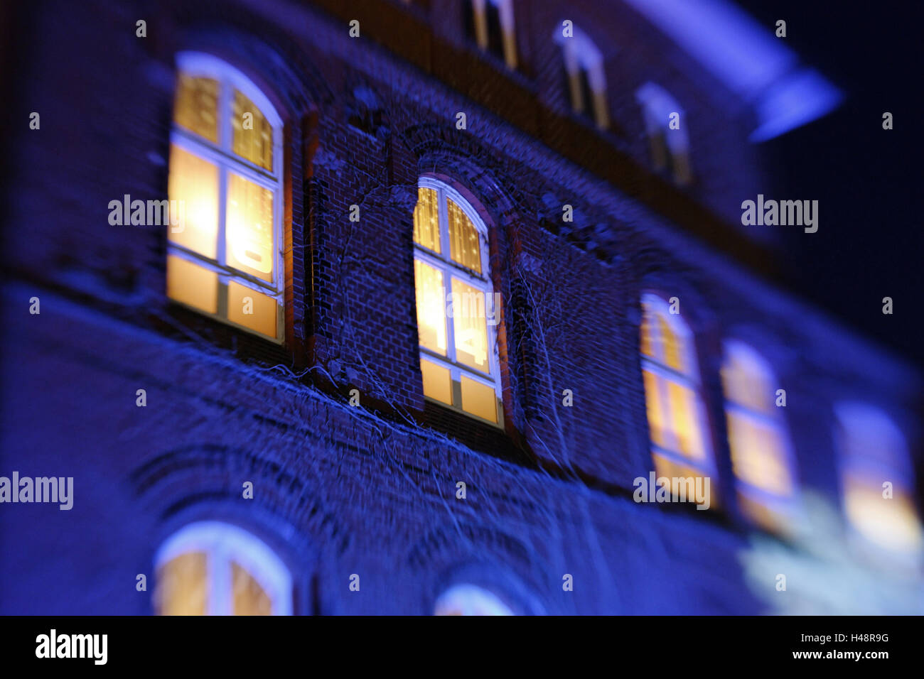 Blue illuminated house facade in the Christmas fair in the harbour city, selective focus, Hanseatic town Hamburg, Germany, Stock Photo