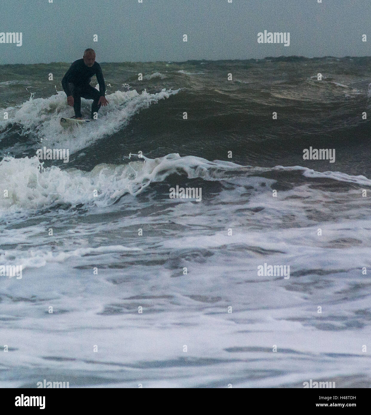 Surfing, sunset, ,kent , cost , sea , sun ,beach , sand , holiday, Stock Photo