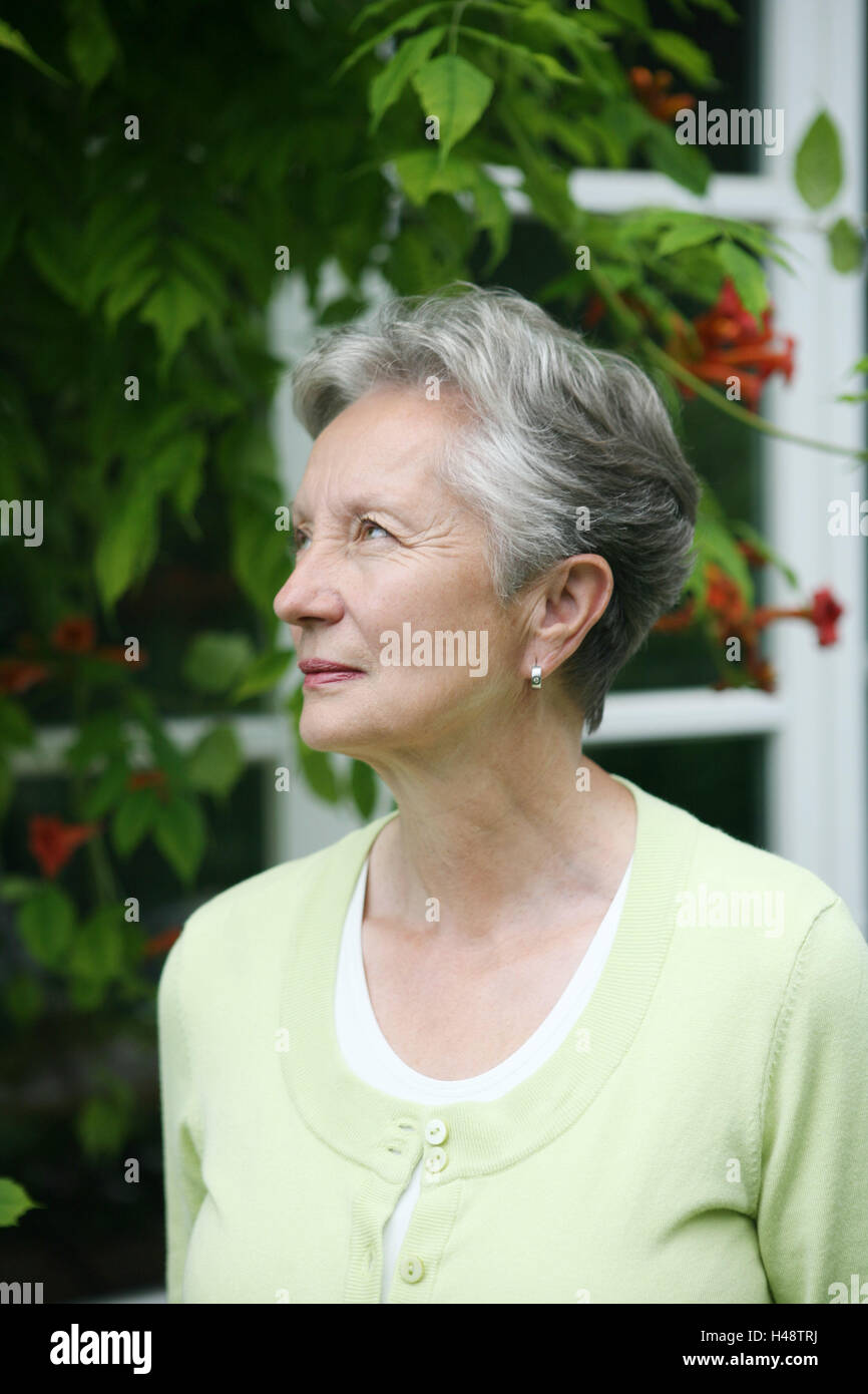 Woman elegantly standing in hi-res stock photography and images - Alamy
