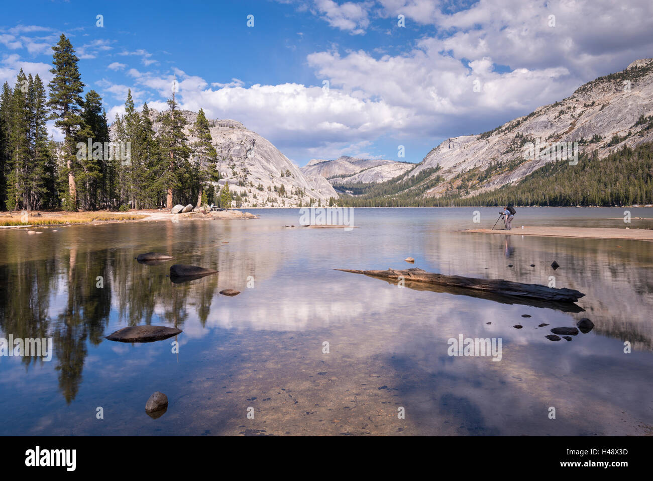 Photographer at Tenaya Lake in Yosemite National Park, California, USA. Autumn (October) 2014. Stock Photo