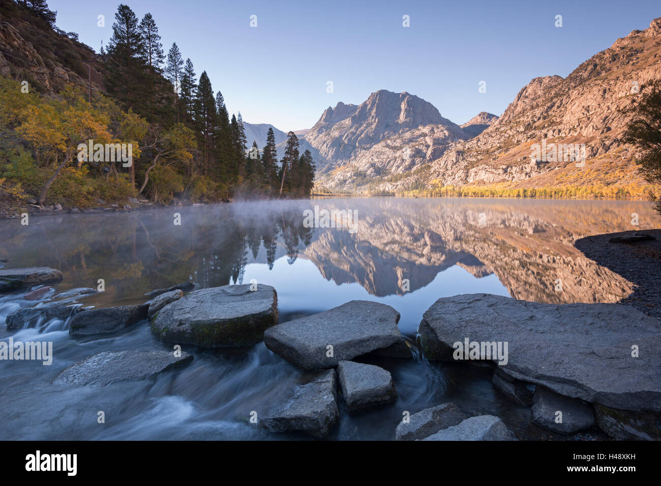 Stepping stones over Silver Lake in the Eastern Sierras, June Lakes, California, USA. Autumn (October) 2014. Stock Photo
