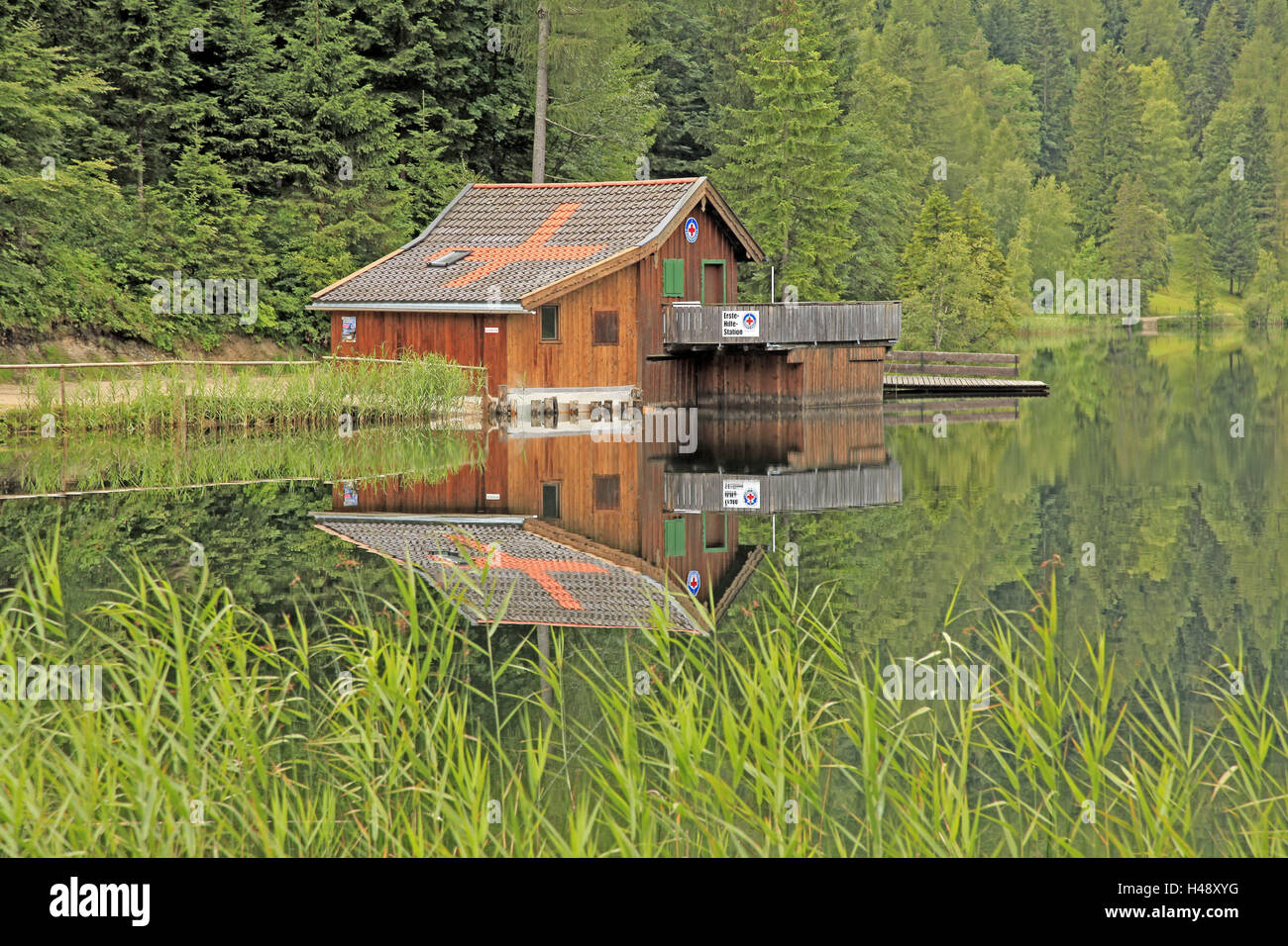First aid station, lake, reflexion, no people, wooden hut, Stock Photo