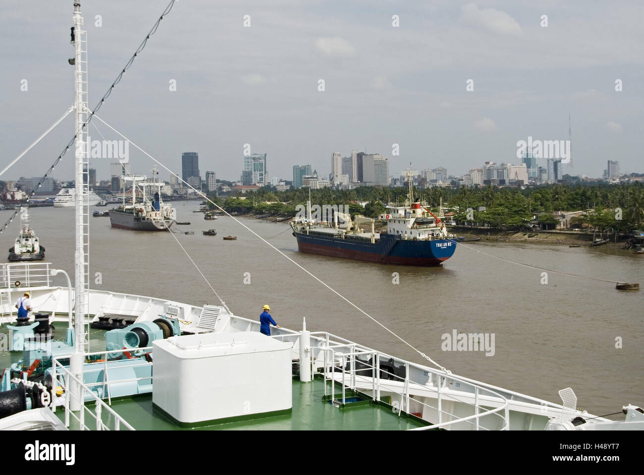 Vietnam, Ho Chi Minh City, high rises, Saigon river, ships, Stock Photo