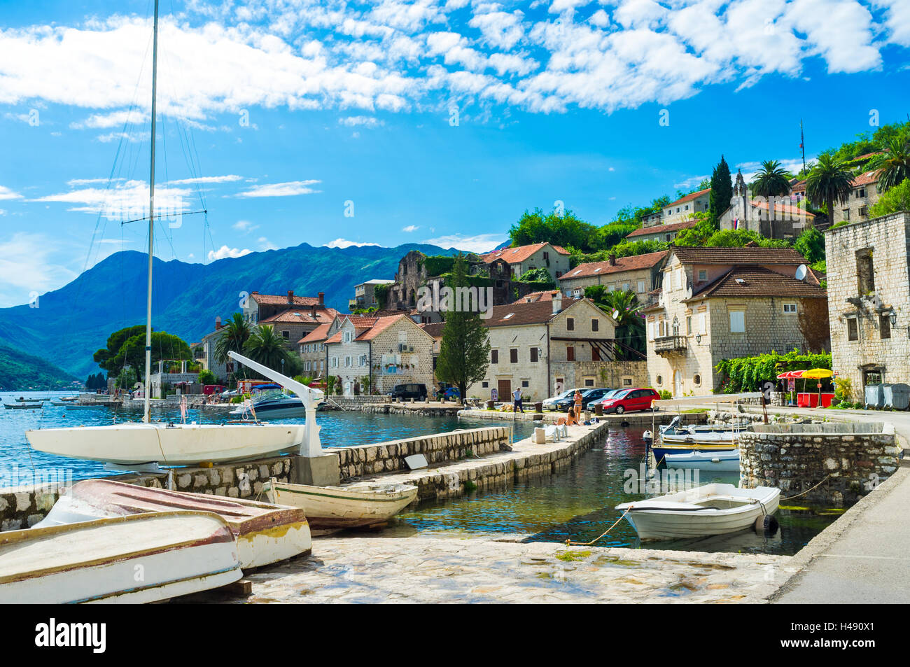 The tiny shipyard with a few fishing boats in Perast town centre