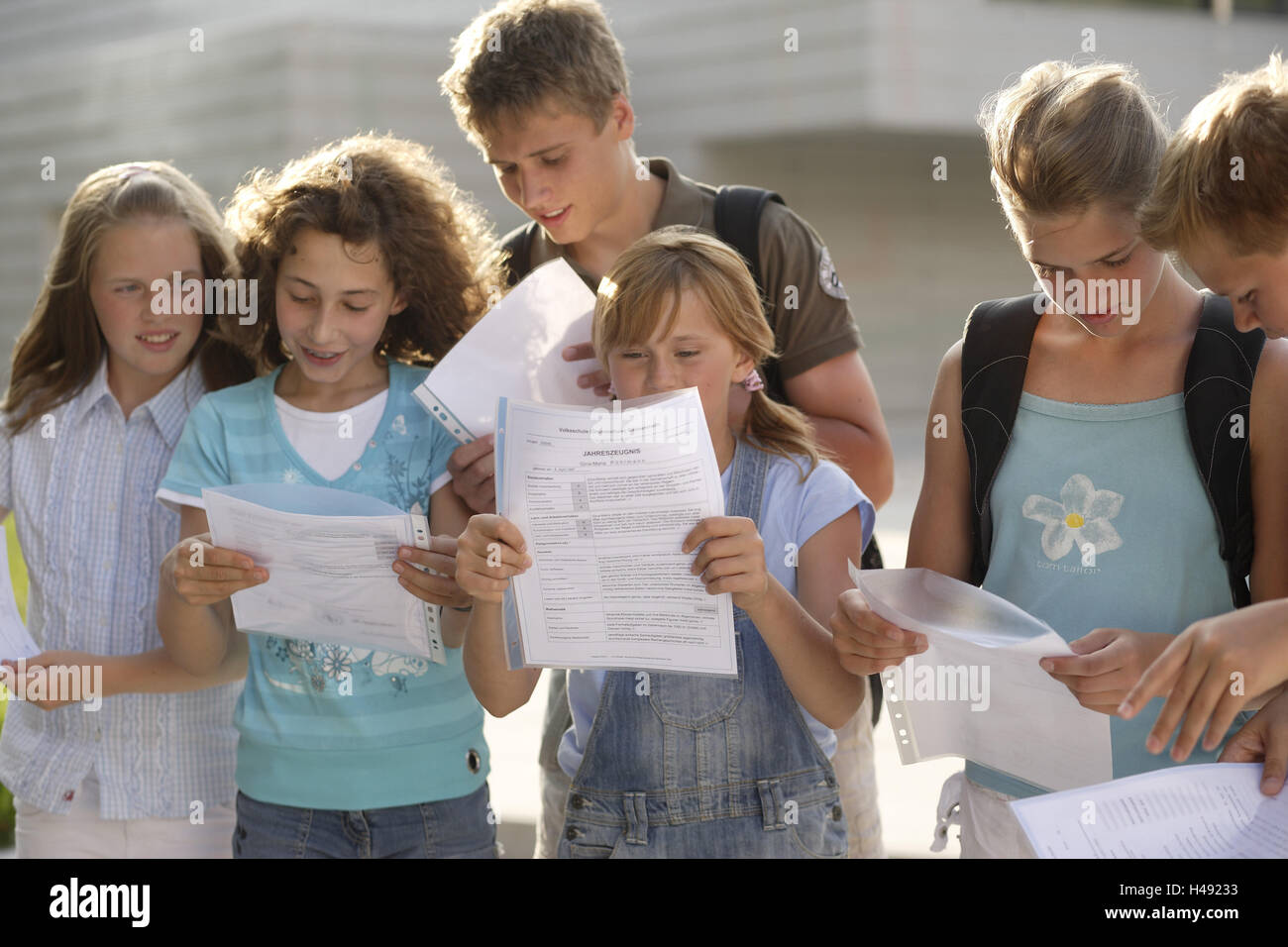 Schoolboys, reports, compare, hold, point, break court, Stock Photo
