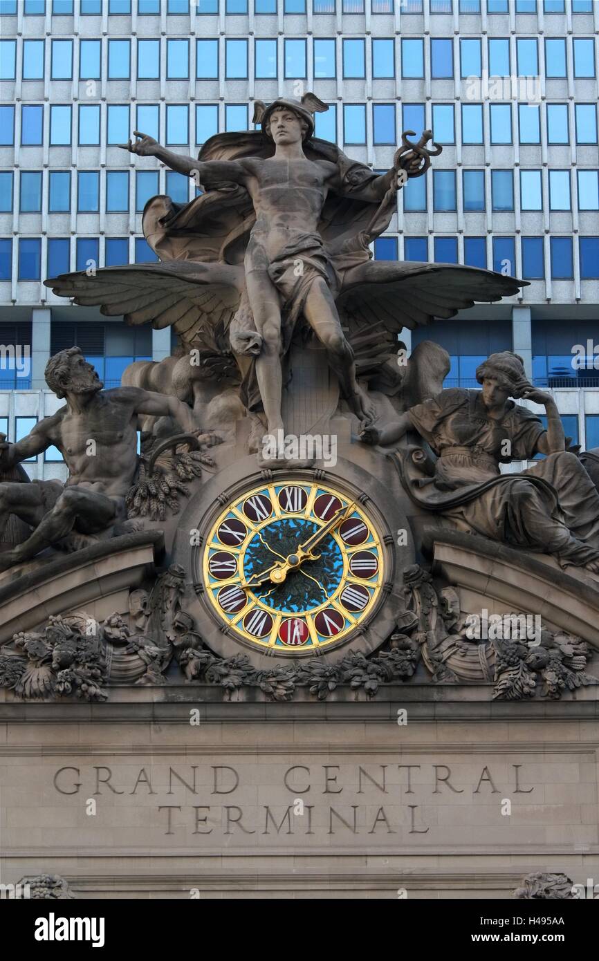 Statue of Mercury flanked by Hercules and Minerva above a clock on top of Grand Central Terminal in Manhattan, New York. Stock Photo