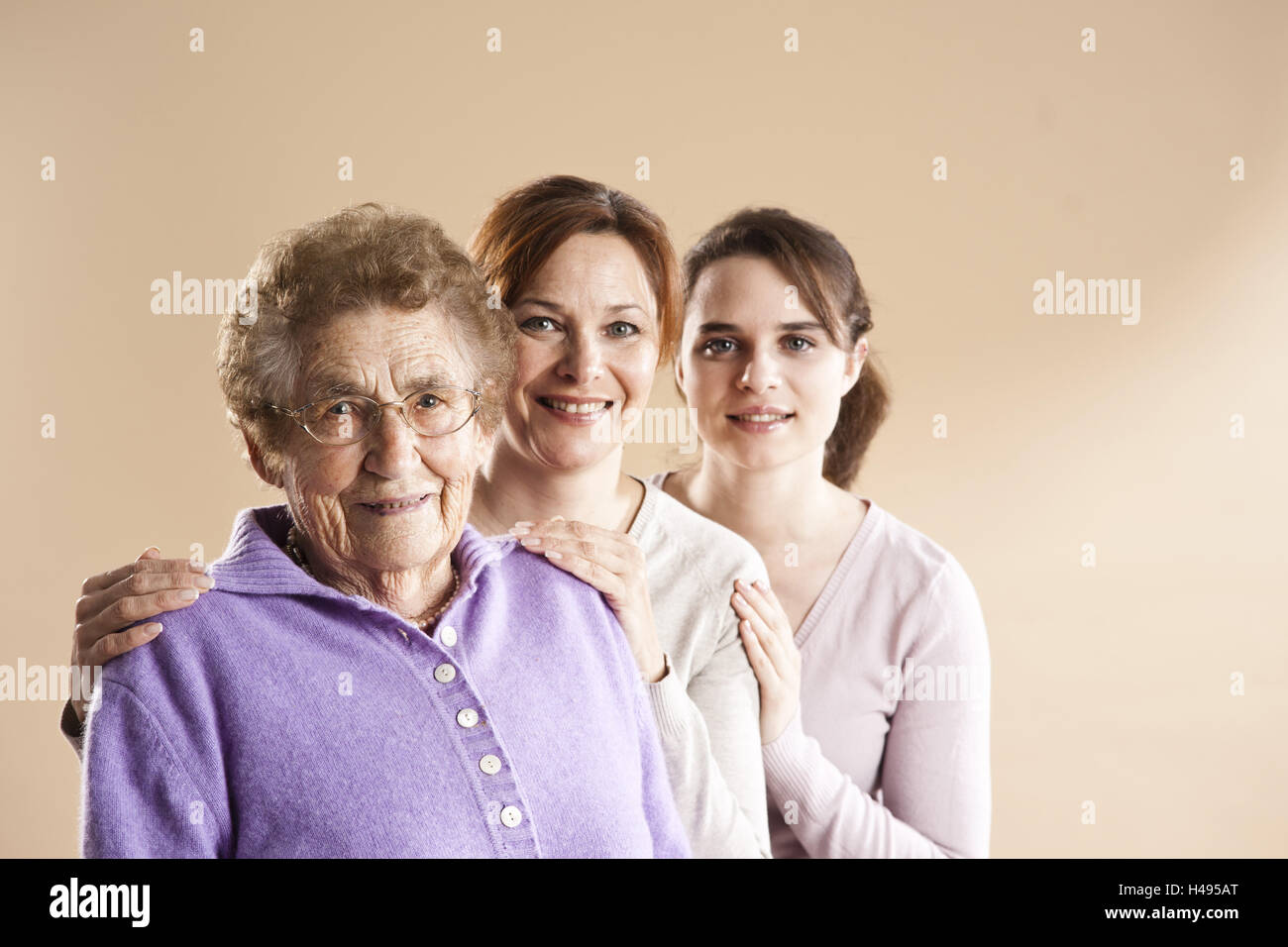 Portrait of a grandmother with her granddaughter and great-granddaughter, Stock Photo