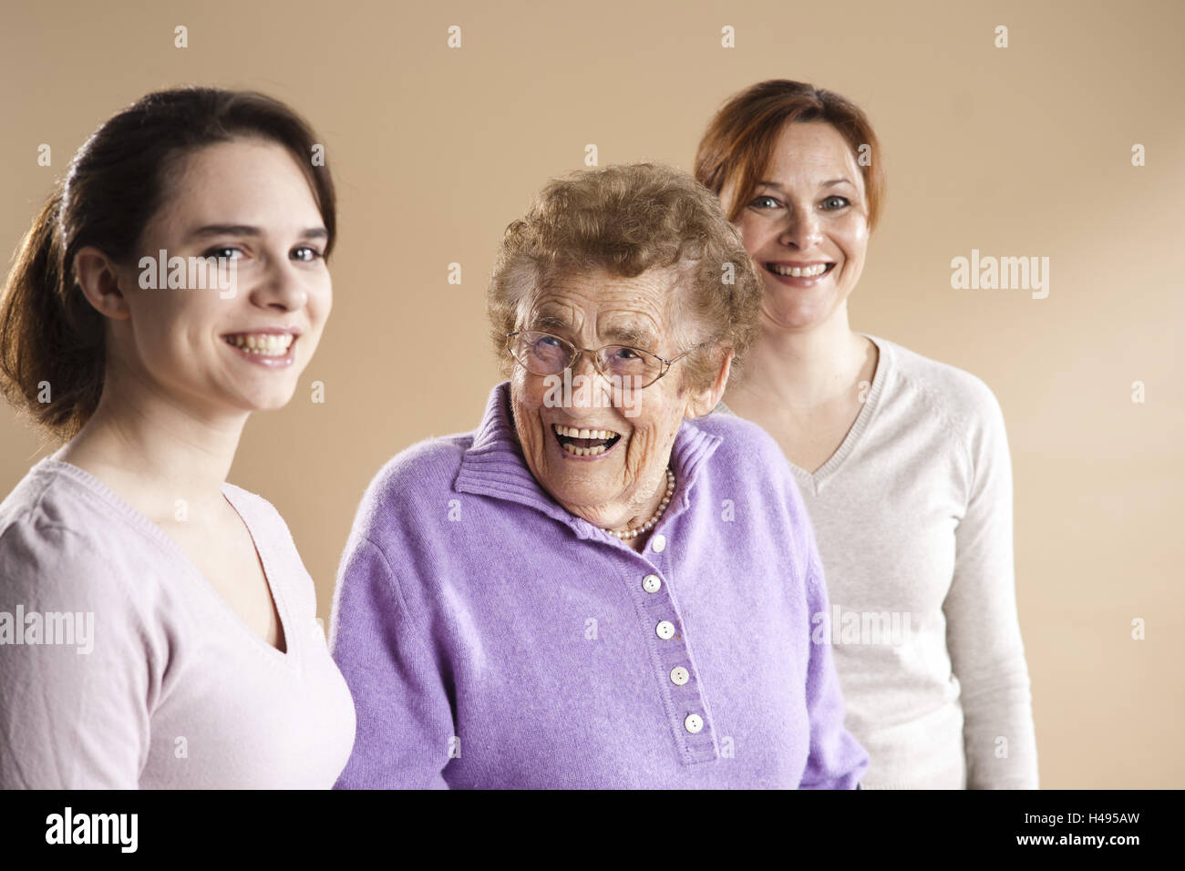 Portrait of a grandmother with her granddaughter and great-granddaughter, Stock Photo
