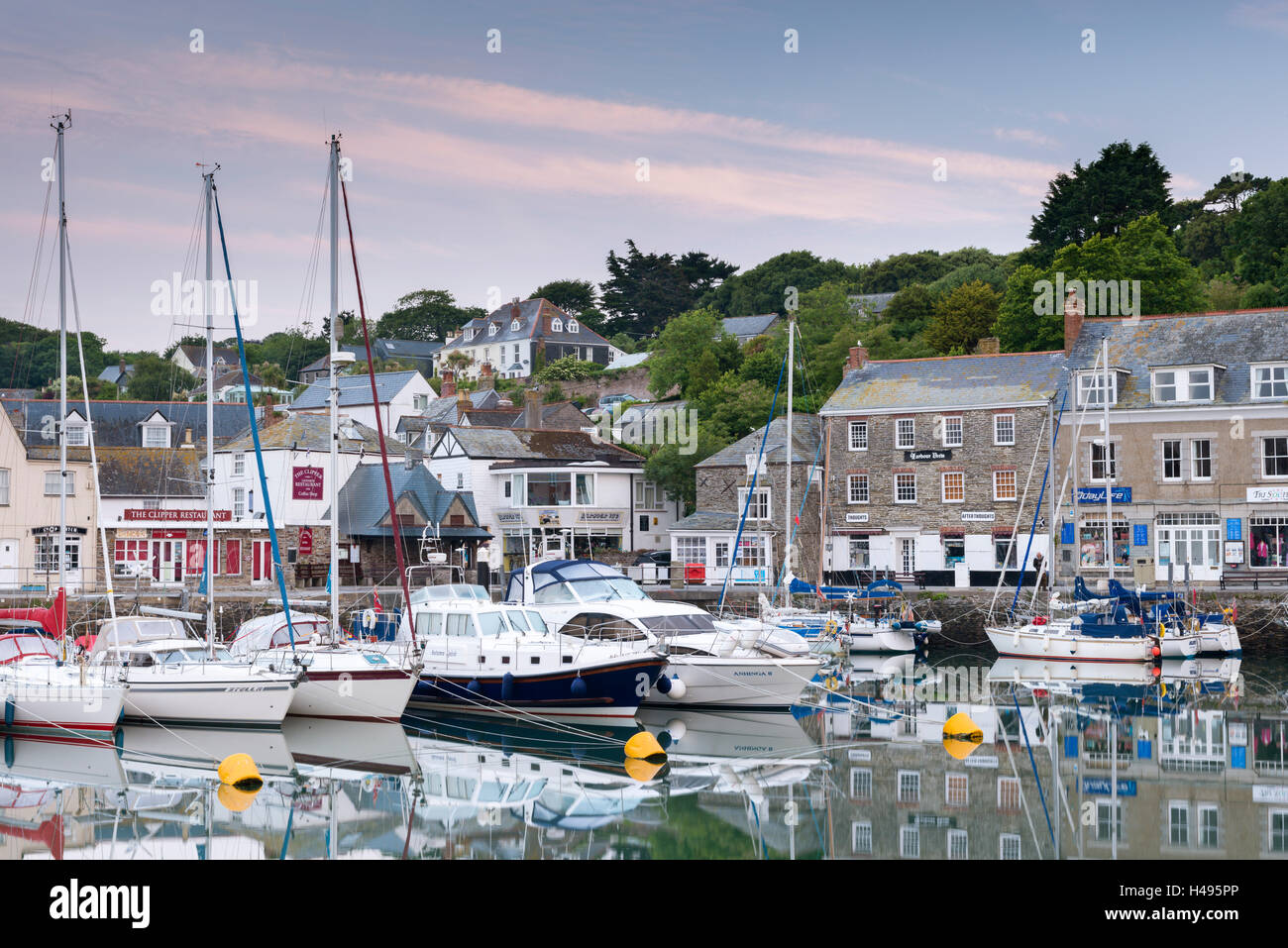 Yachts moored in Padstow harbour at dawn, Cornwall, England. Spring (June) 2013. Stock Photo