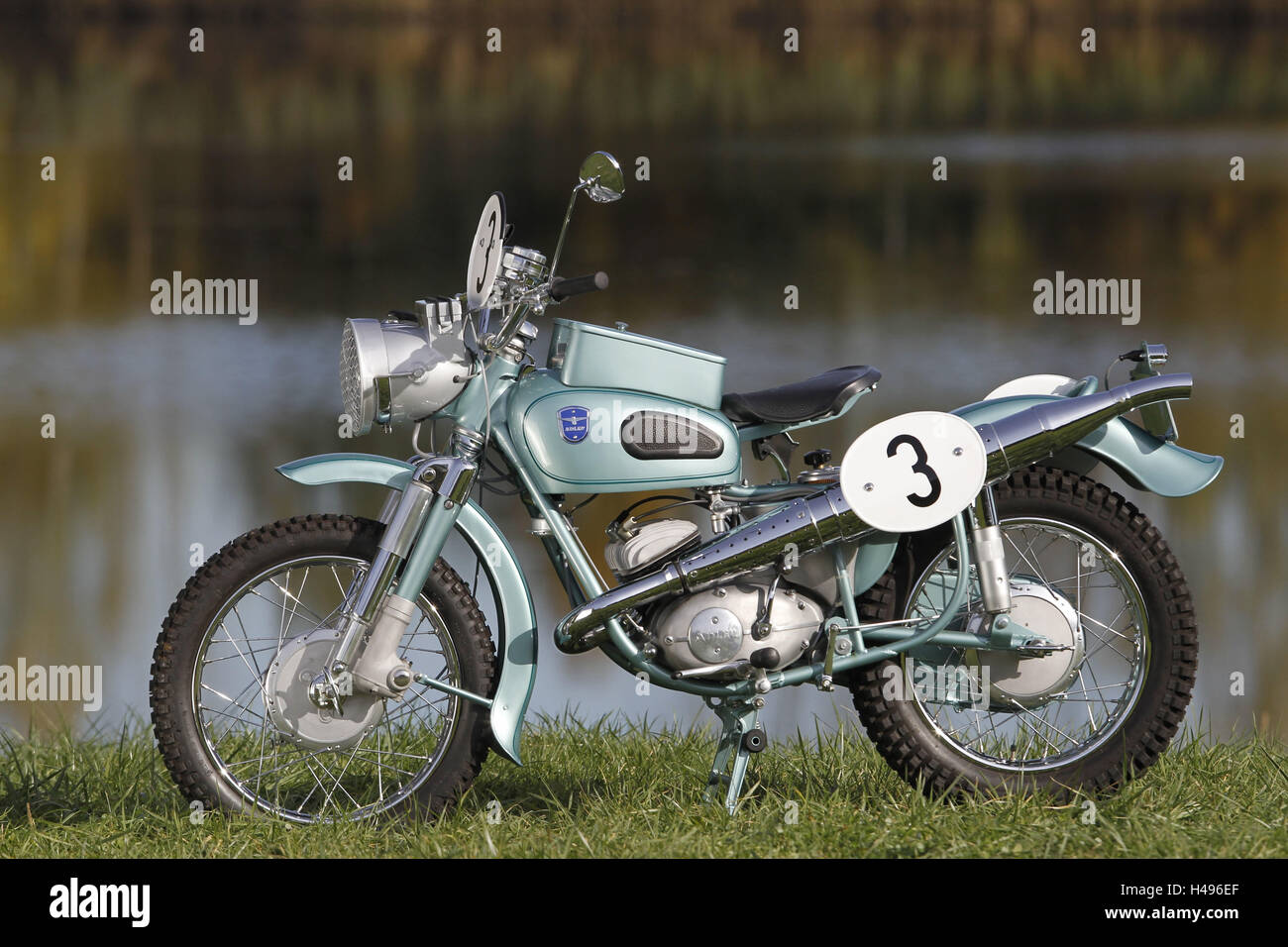 Motorcycle, eagle, old-timer, year manufacture unknown, vertical, left page, Stock Photo