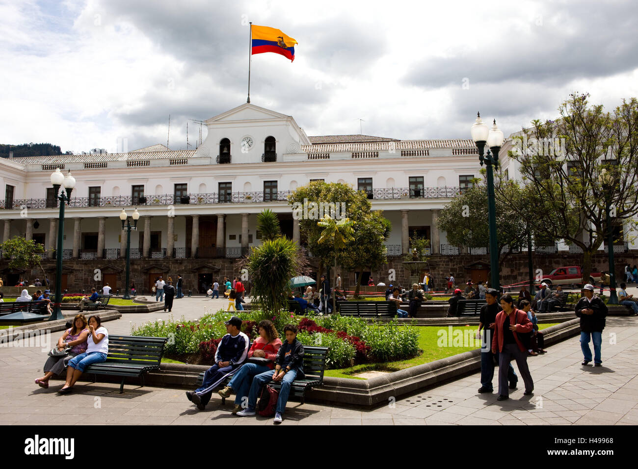 Ecuador, province Pichincha, Quito, plaza de la Independencia, presidential palace, park, passer-by, South America, town, capital, architecture, building, structure, outside, facade, flag, flag, space, person, pedestrian, place of interest, Stock Photo