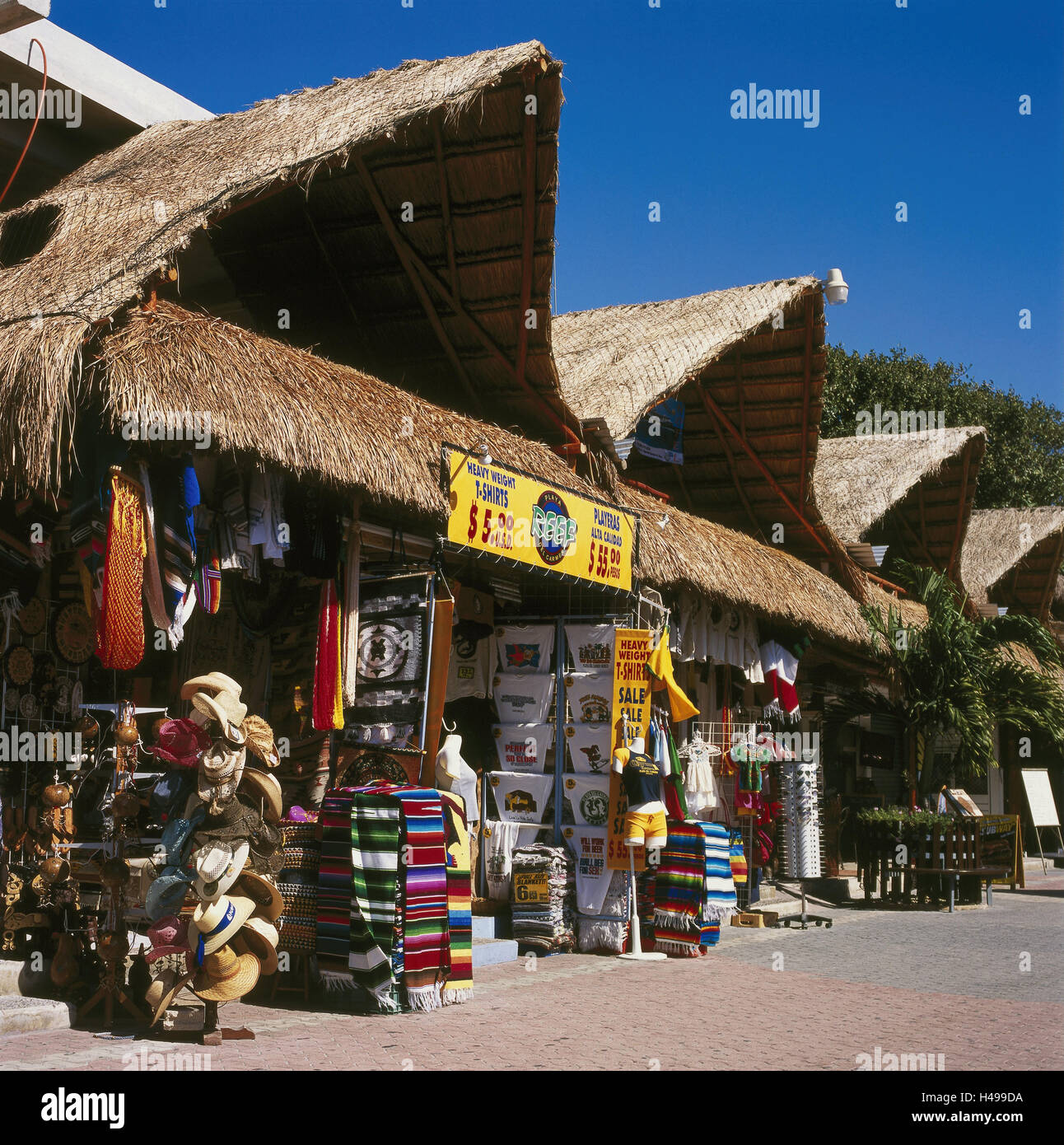 Mexico, Quintana Roo, Playa del Carmen, pedestrian area, Central America, Latin America, destination, tourism, building, shops, straw roofs, roofs, typically for country, souvenirs, tourist shop, memory, sales, retail trade, outside, deserted, Stock Photo