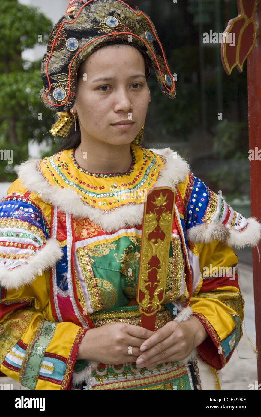Vietnam, woman, young, fixed clothes, half portrait, Stock Photo