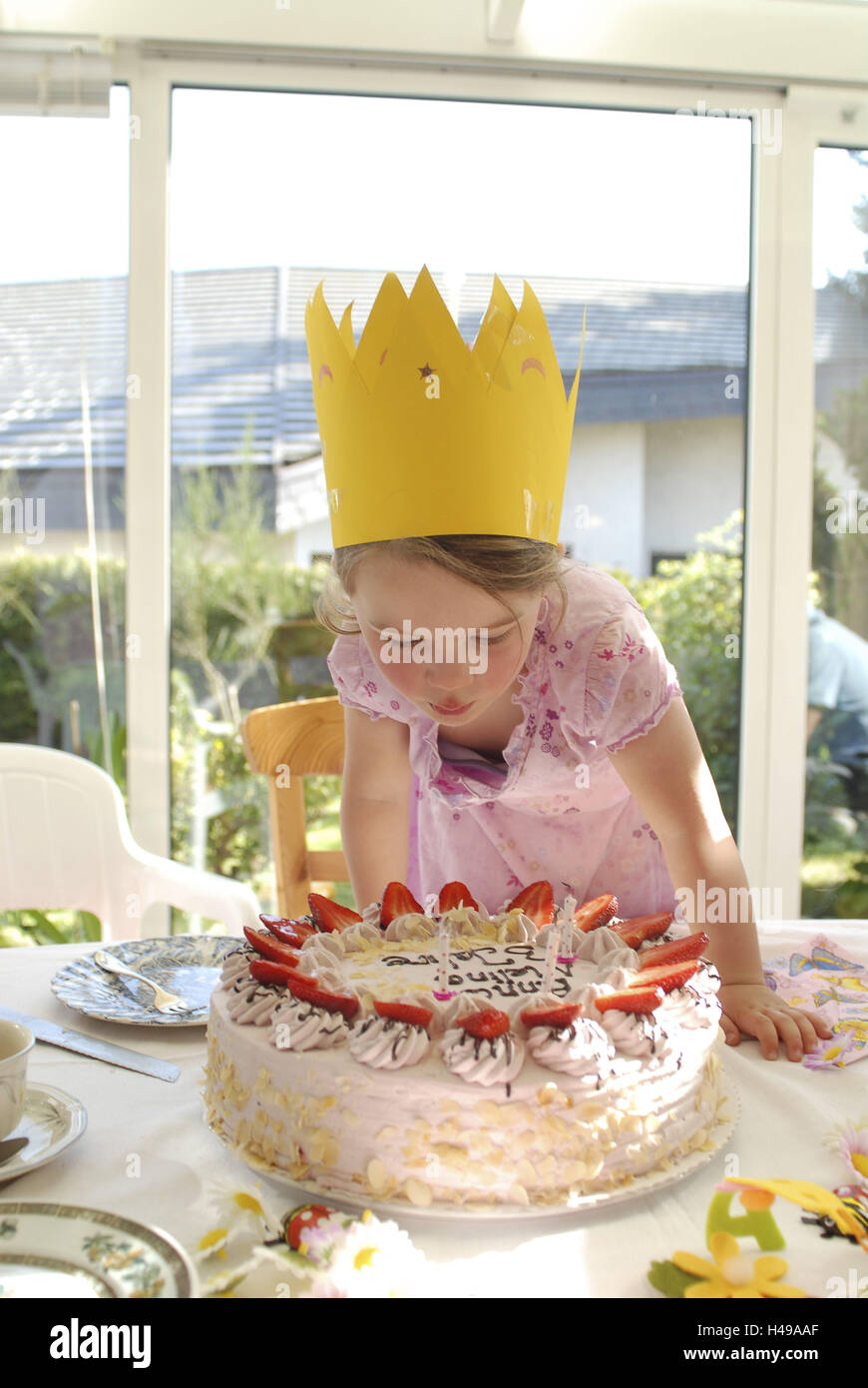 Girl, birthday, cake, candles blow out Stock Photo Alamy