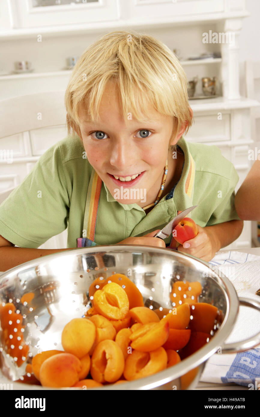 Boy, cuisine, apricots Stock Photo Alamy