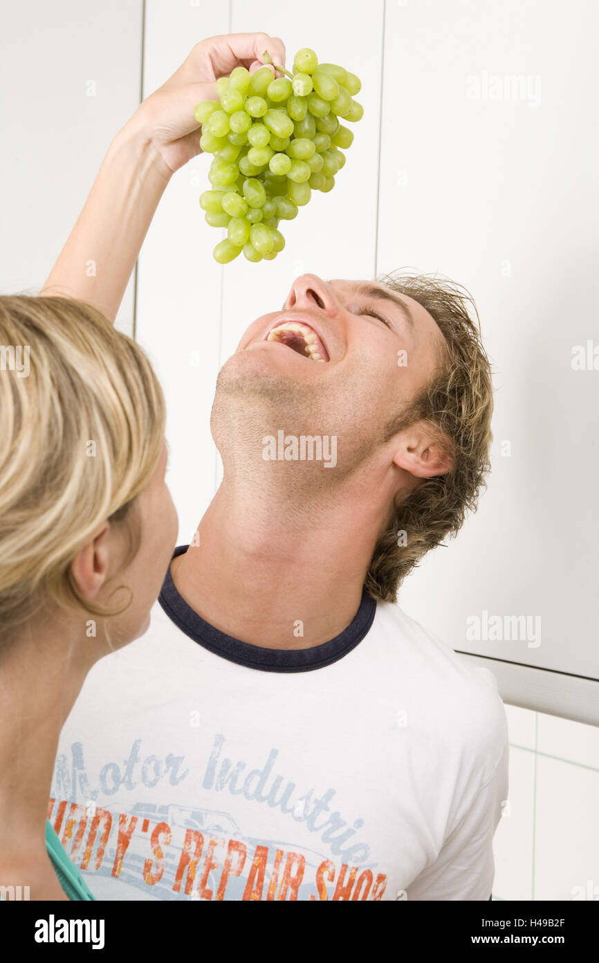 Woman, grapes, man, feed Stock Photo - Alamy