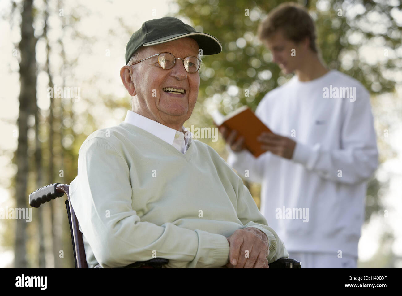 Park, boss, invalid's wheel chair, sit, geriatric nurses, stand, read, autumn, Stock Photo