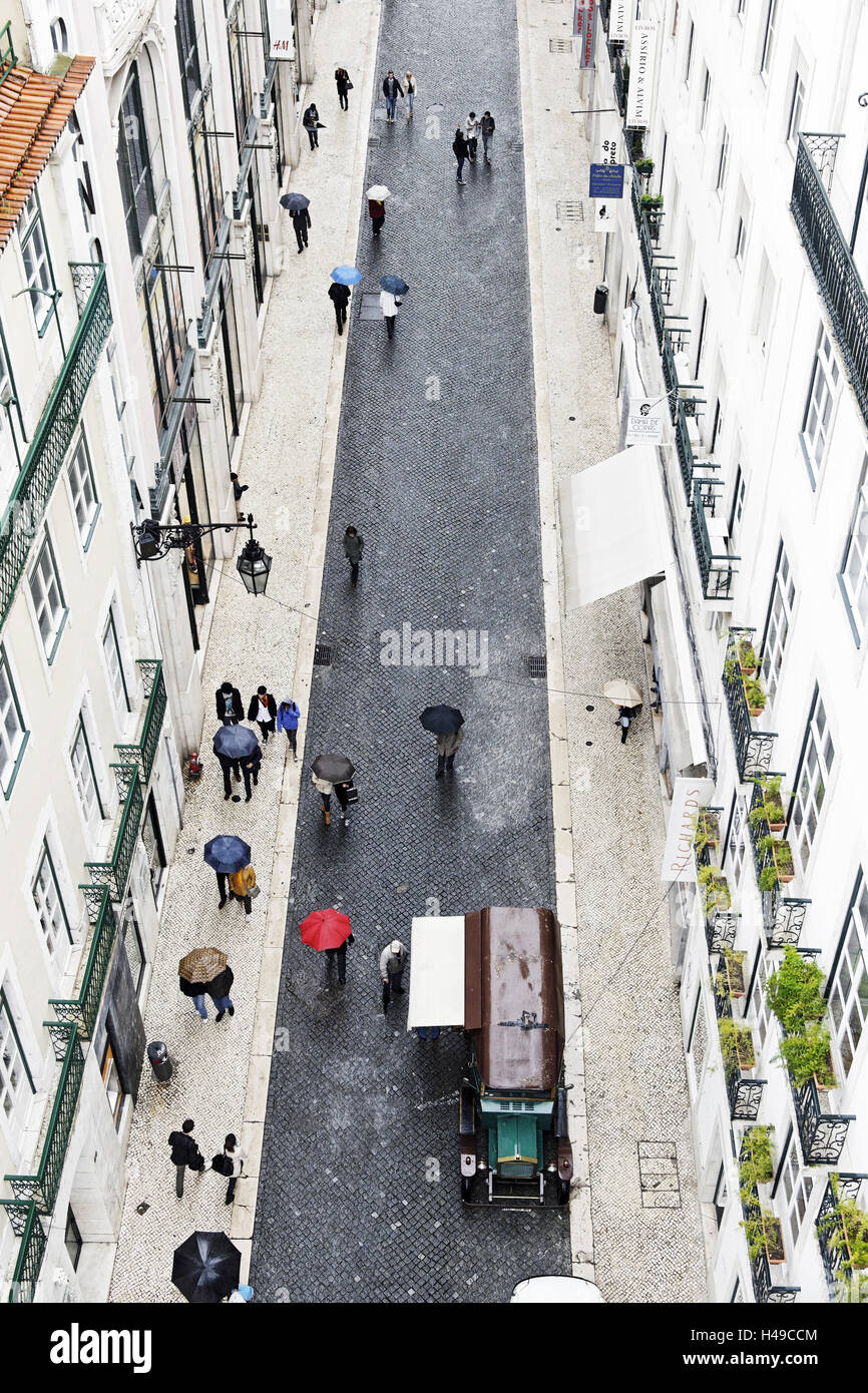 People with colourful umbrellas, vertical view from the Elevador de