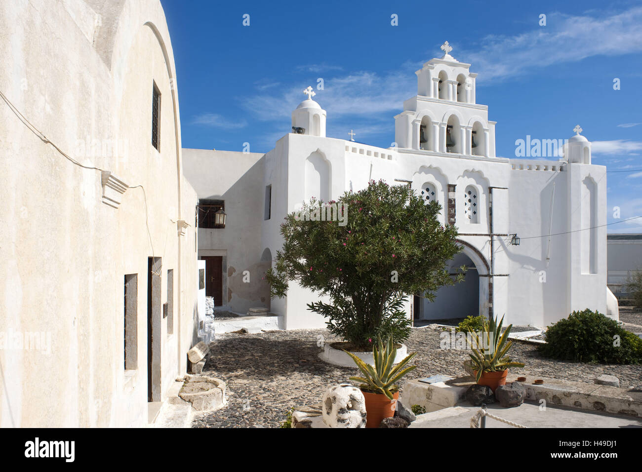 Greece, the Cyclades, Santorini, Pyrgos, church the archangel Michael and holy Theodora in the Old Town Kastelli, on the left the band Agia Triada, museum for icons and liturgical objects, Stock Photo