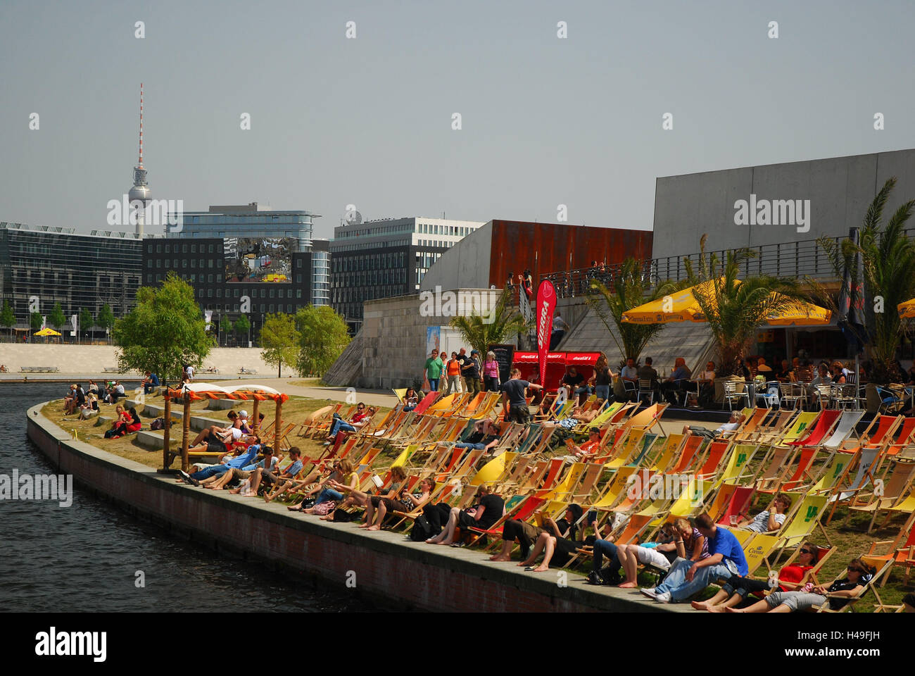 Germany, Berlin, Spree bow, beach cafe, deck chairs, people, town, capital, the Spree, river, riverside, summer, solar bath, guests, tourists, sun benches, take it easy, recreation, rest, leisure time, Stock Photo