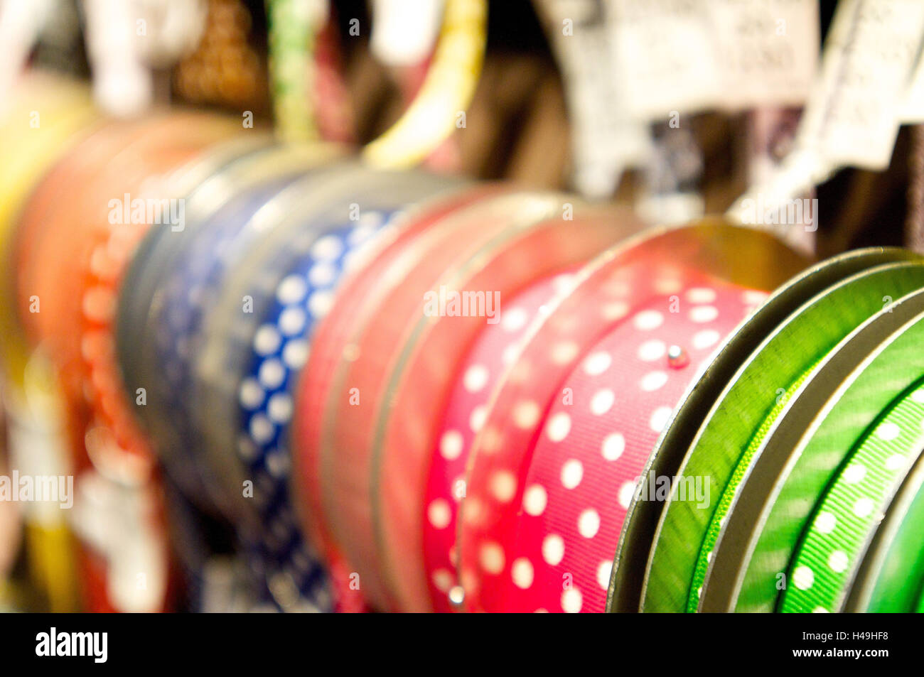Ribbons and bows on spools, Stock Photo