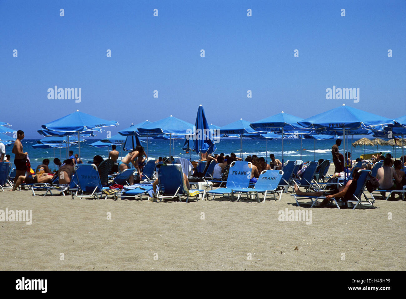 Greece, Crete, Ammoudara, beach, sunshades, tourists, Stock Photo