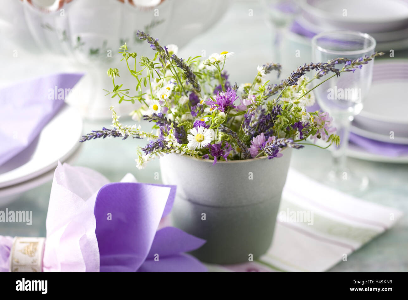 Table decoration with wild flowerbouquet, Stock Photo