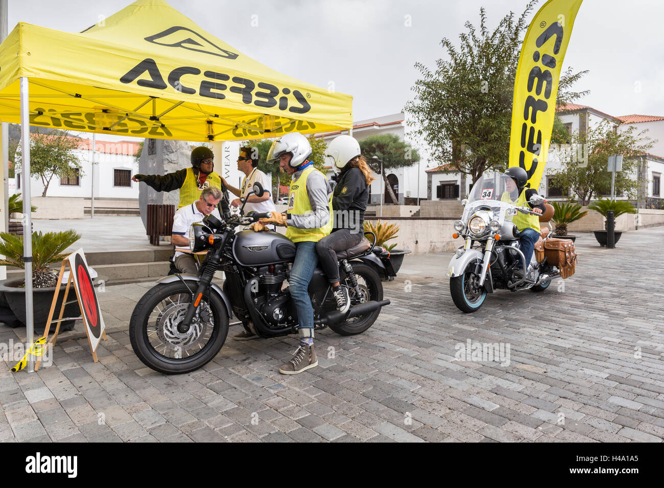 Classic and modern motorcycles during the first days route from Santiago del Teide through Masca and return.  Queens Cavalcade event, during which 91 motorcycles will spend 4 days completing various routes throughout the Canary Islands. Stock Photo