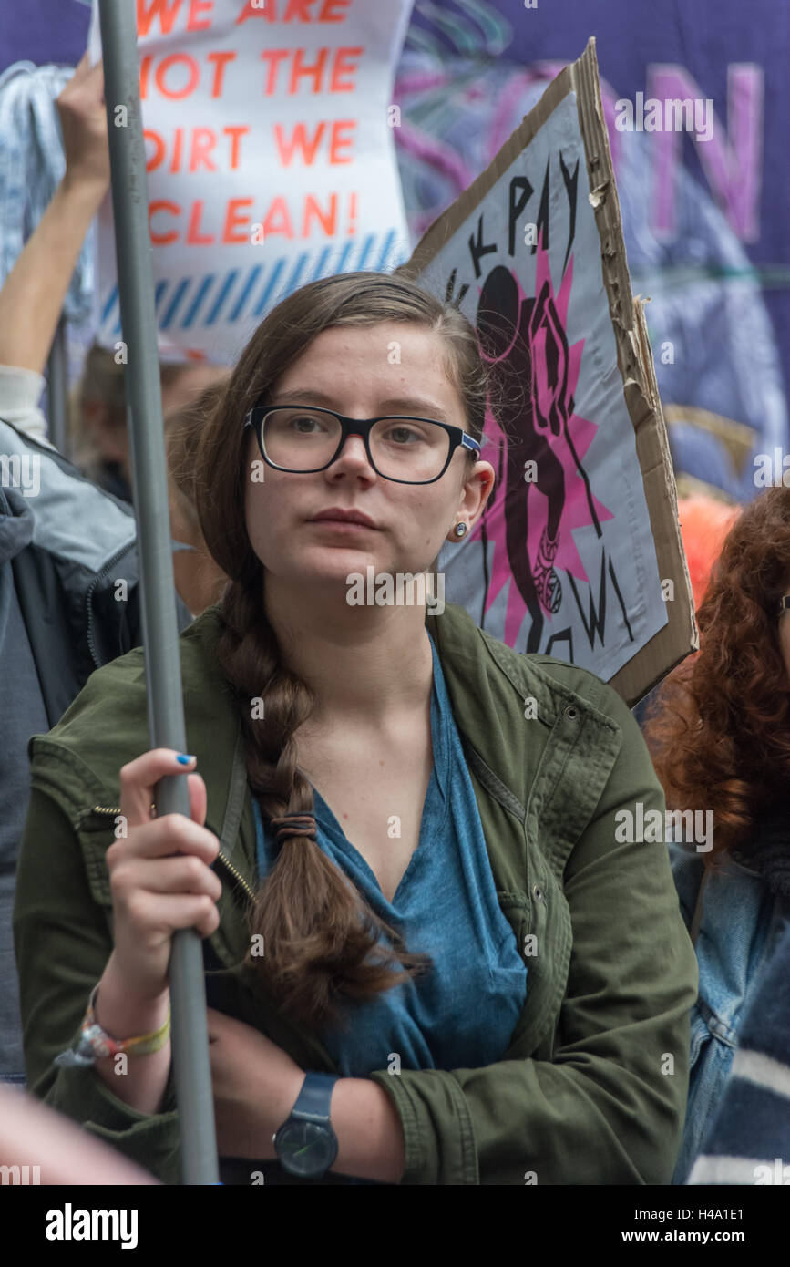 London, UK. 14th October 2016. A student at the protest demanding the reinstatement of sacked Ecuadorian cleaner Alba, a 62-year old who is one of the longest serving members of the cleaning team at the London School of Economics  outside the LSE Kingsway building where cleaning contractors Noonan have their office. The United Voices of the World union say Alba has been unfairly sacked in breach of employment law and the protest demanded he re-instatement. They accuse the   LSE management of failing to require Noonan act fairly towards staff. Credit:  Peter Marshall/Alamy Live News Stock Photo