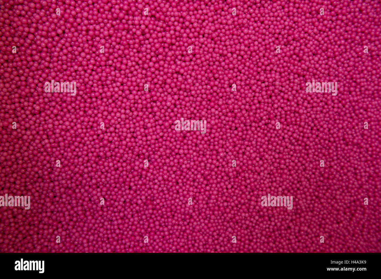 Gorlitz, Germany. 20th Sep, 2016. Pink love pearls can be seen in the sweets factory of Rudolf Hoinkis GmbH in Gorlitz, Germany, 20 September 2016. The sweets factory was founded on 16 August 1896 by Rudolf Hoinkis, the grandfather of nowadays' factory owner, Matthias Hoinkis. The business owes its worldwide publicity to the invention of the 'love pearl'. PHOTO: ARNO BURGI/dpa/Alamy Live News Stock Photo