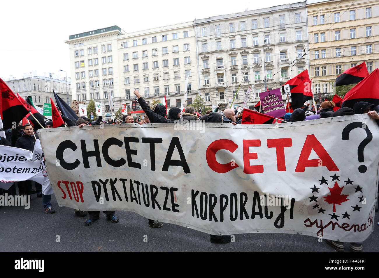 Poland, Warsaw, 15th October 2016: Several NGOs, Green Party, Antifa and Solidarnosc (labour union) held protest march against TTIP and CETA at the Ministry of Agriculture in Poland. Credit: Madeleine Ratz/Alamy Live News Stock Photo