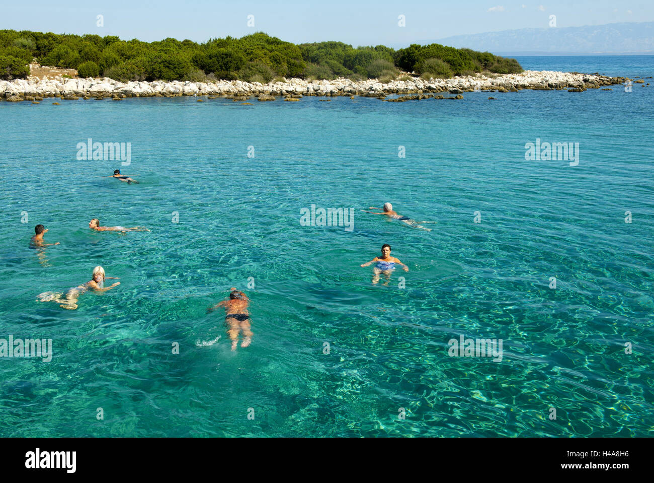Croatia, island Losinj, Veli Losinj, boot excursion, person swim in the sea, Stock Photo