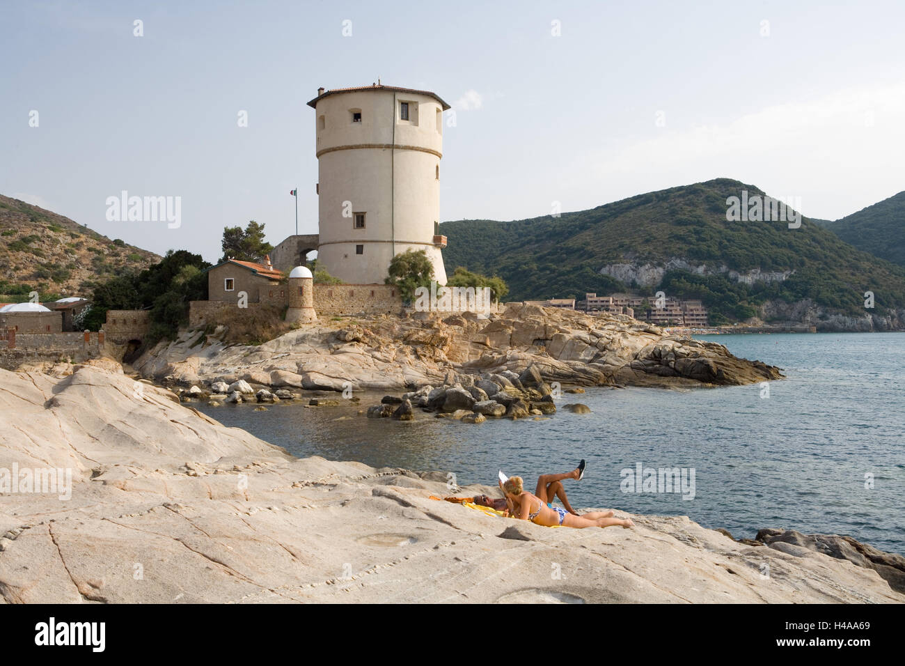 Italy, Tuscany, 'Isola del Giglio', Campese, rocks, tourists, lighthouse, Stock Photo