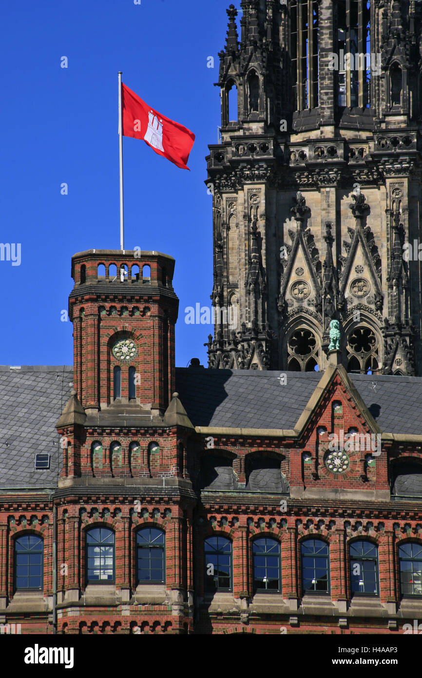 Hamburg-Flagge on the Laeiszhof built in 1898 behind it the Nikolai tower, Stock Photo