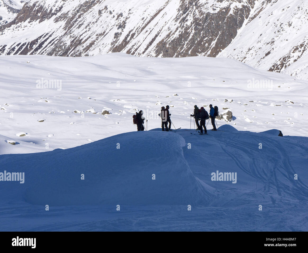 Austria, Vorarlberg, Montafon, Rotbühelspitze, hill, shadow, group of ski tourers, Stock Photo
