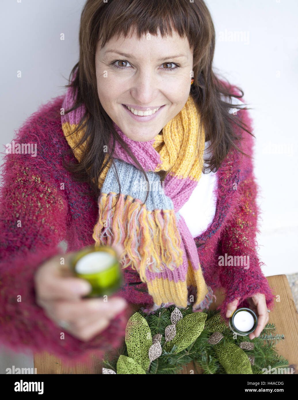 Woman makes Christmas decoration, outside, portrait, Stock Photo