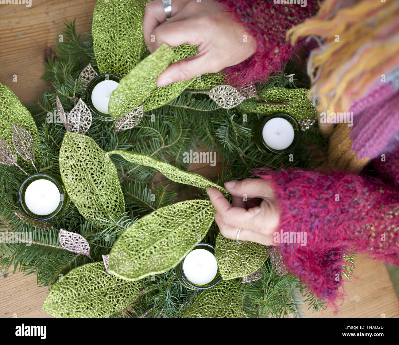 Woman makes Christmas decoration, medium close-up, detail, Stock Photo
