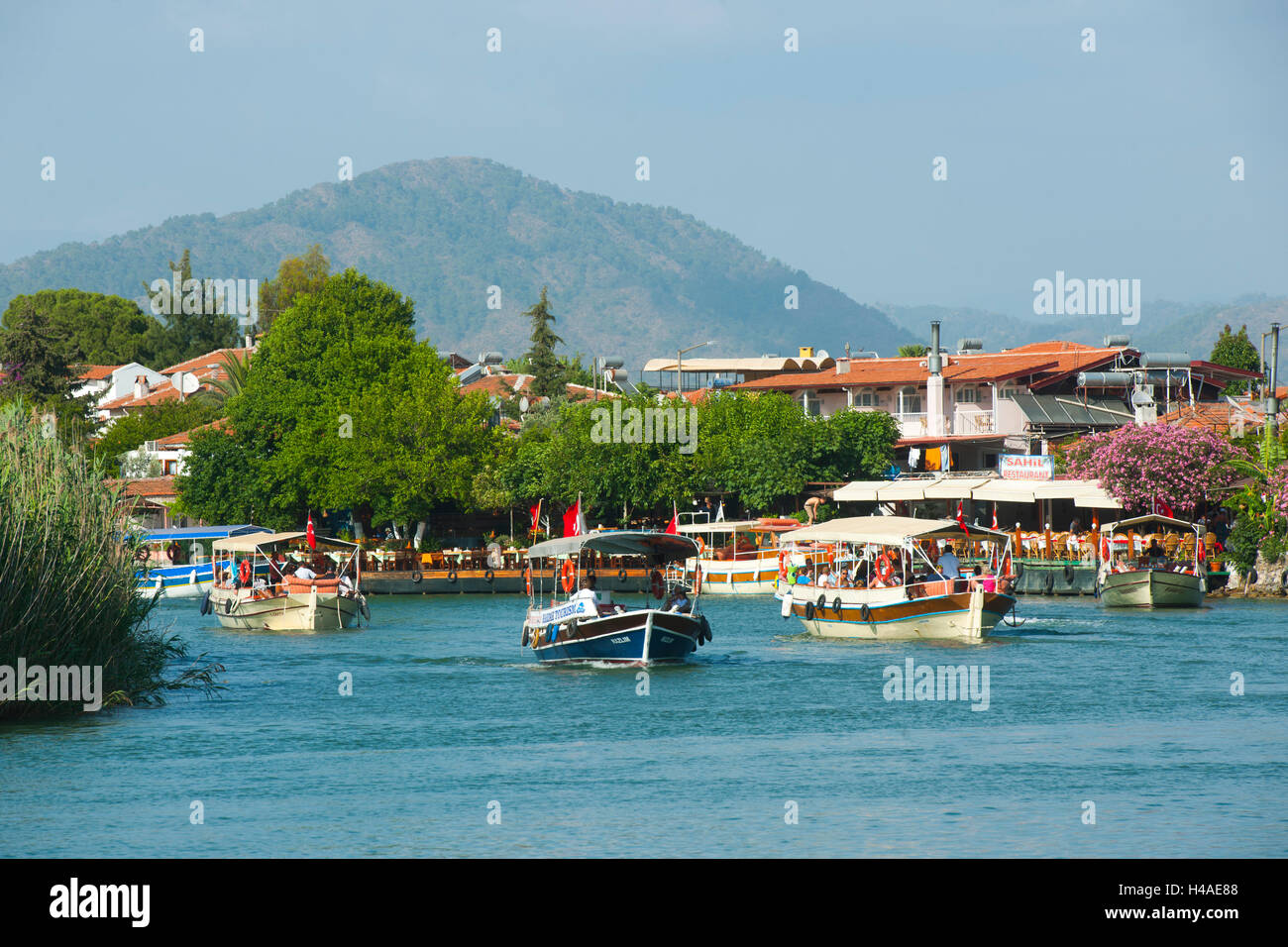 Turkey, province of Mugla, Dalyan, excursion boats in the channel, Stock Photo