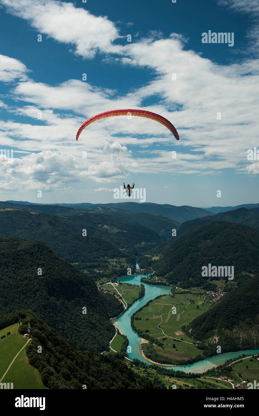 Paraglider above the Soca Valley, Julian Alps, Tolmin, Soca, mountain river, Slovenia Stock Photo