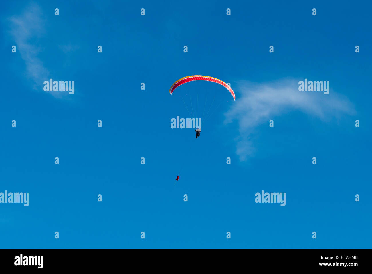 Paraglider, aviation, paragliding, winch start, paraglider winch, start, paraglider start, blue sky, old town, Bavaria, Germany Stock Photo