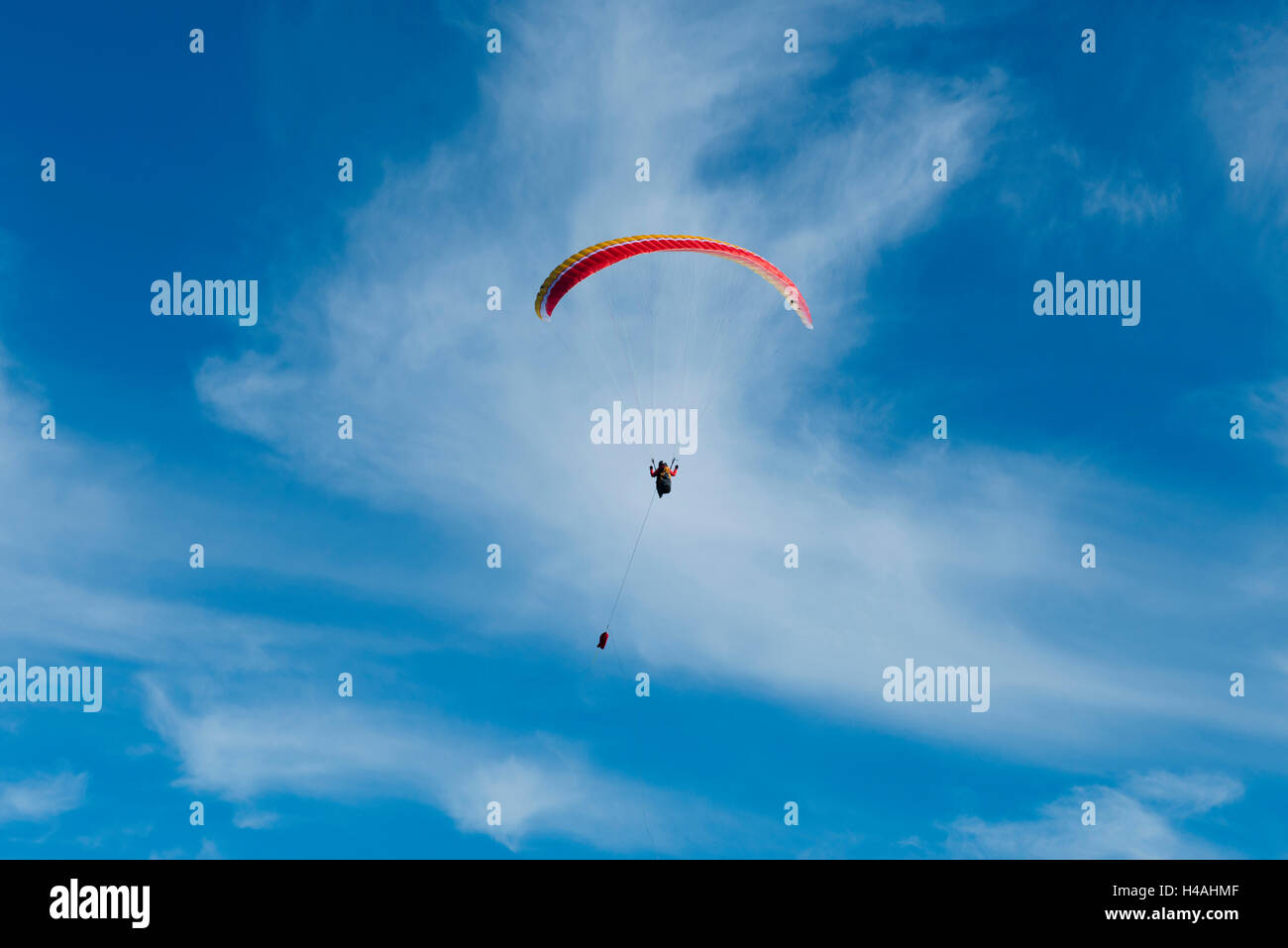 Paraglider, aviation, paragliding, winch start, paraglider winch, start, paraglider start, blue sky, old town, Bavaria, Germany Stock Photo