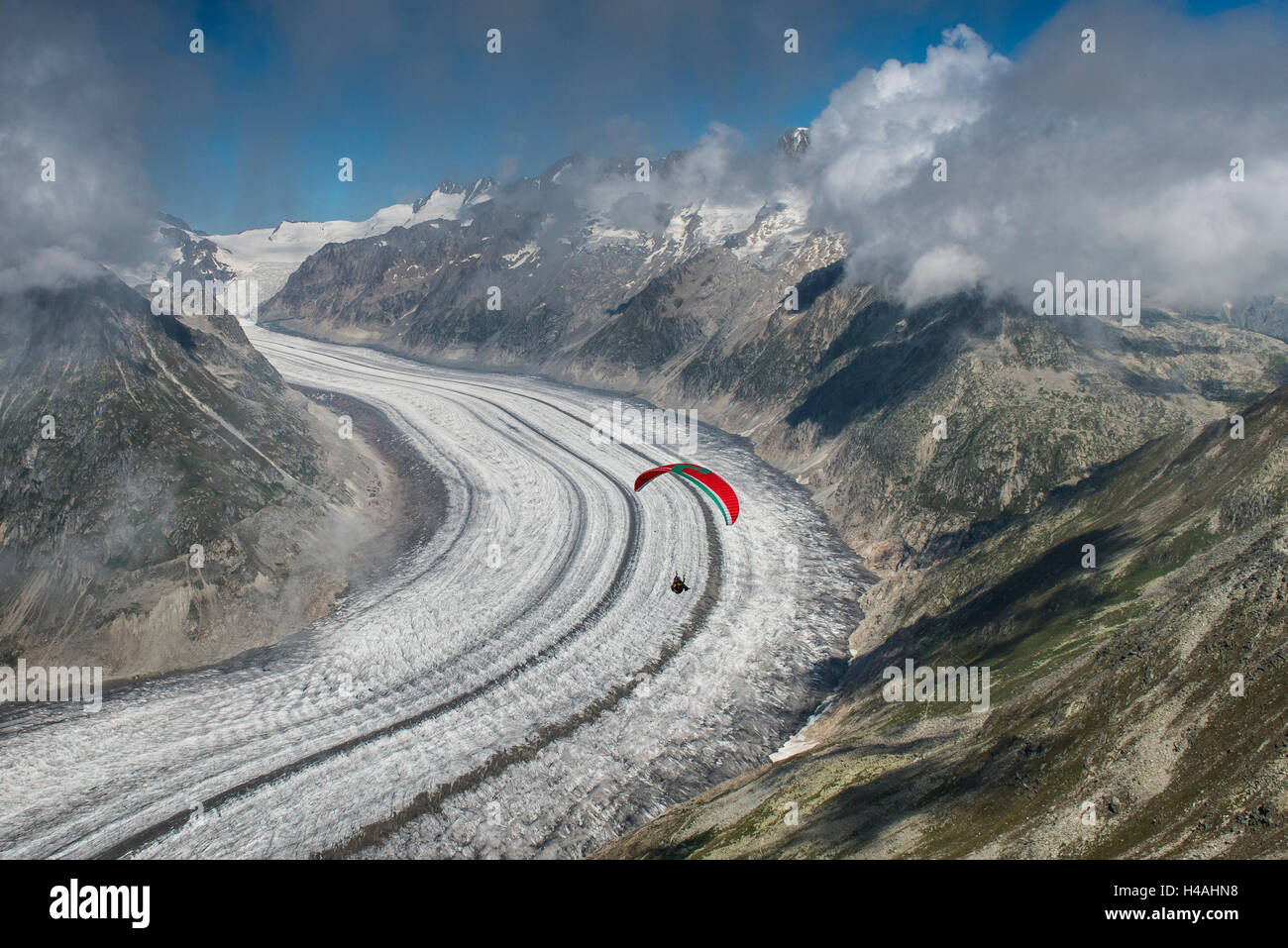 Paraglider above Aletsch glacier, paraglider, aerial picture, Eggishorn, Fiesch, Valais, Switzerland Stock Photo