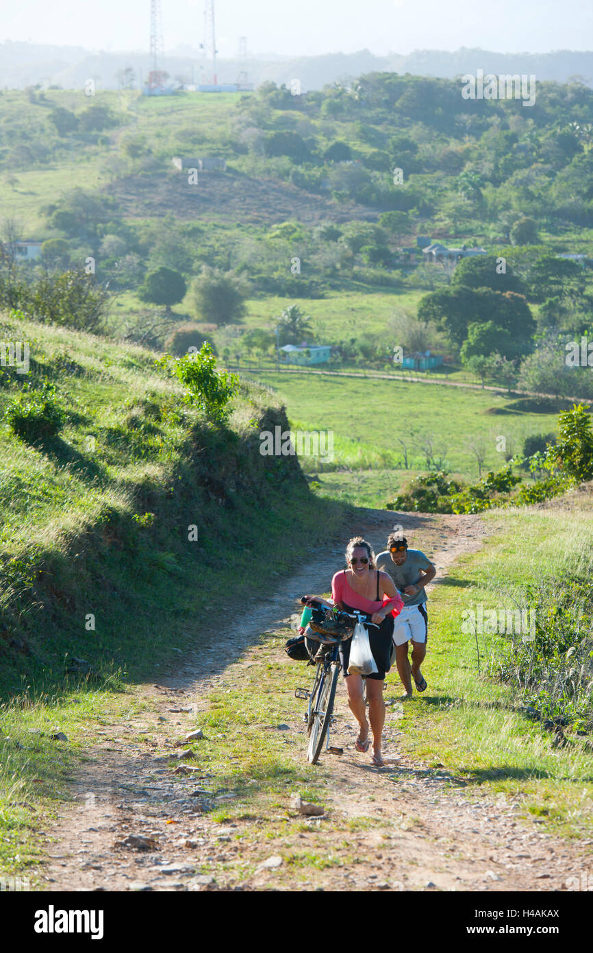 The Dominican Republic, peninsula Samana, batch Galeras, cyclist on the way to the restaurant tablespoon Monte Azul with the settlement Guazuma Stock Photo
