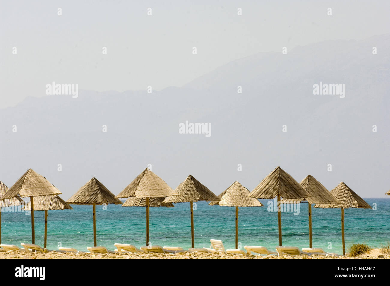 Greece, Crete, Ireapetra, the unoccupied island Chrissi, Bade3strand, lying and sunshades, Stock Photo