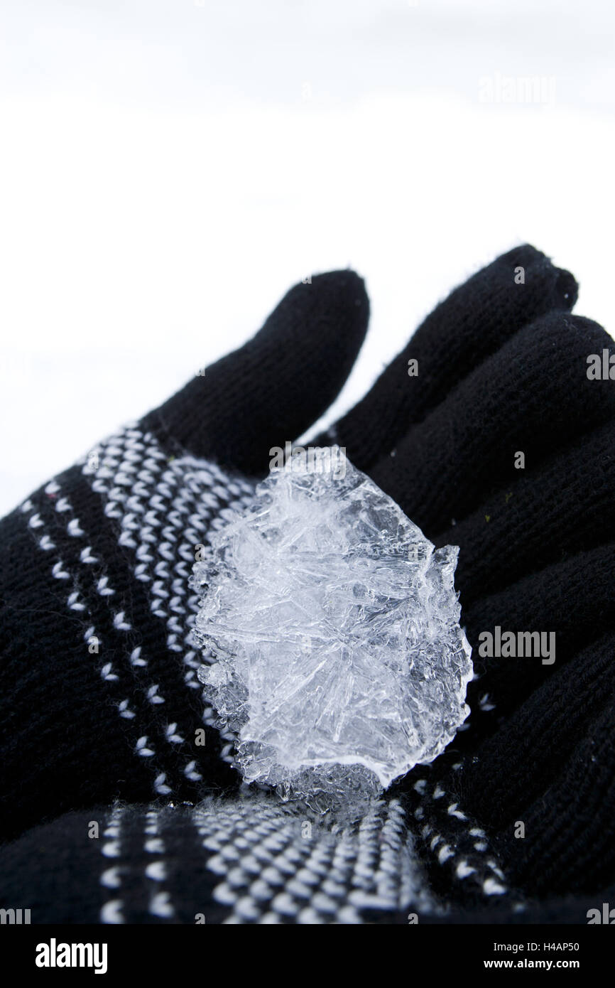 ice in the hand, gloves, Norwegian pattern, Stock Photo