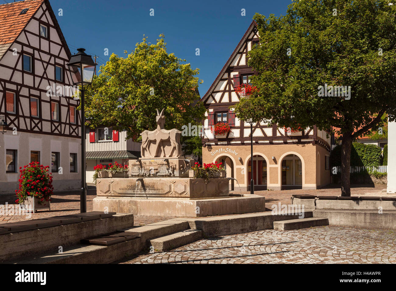Germany, Baden-Württemberg, Swabian Jura, Hayingen, marketplace and goat fountain Stock Photo