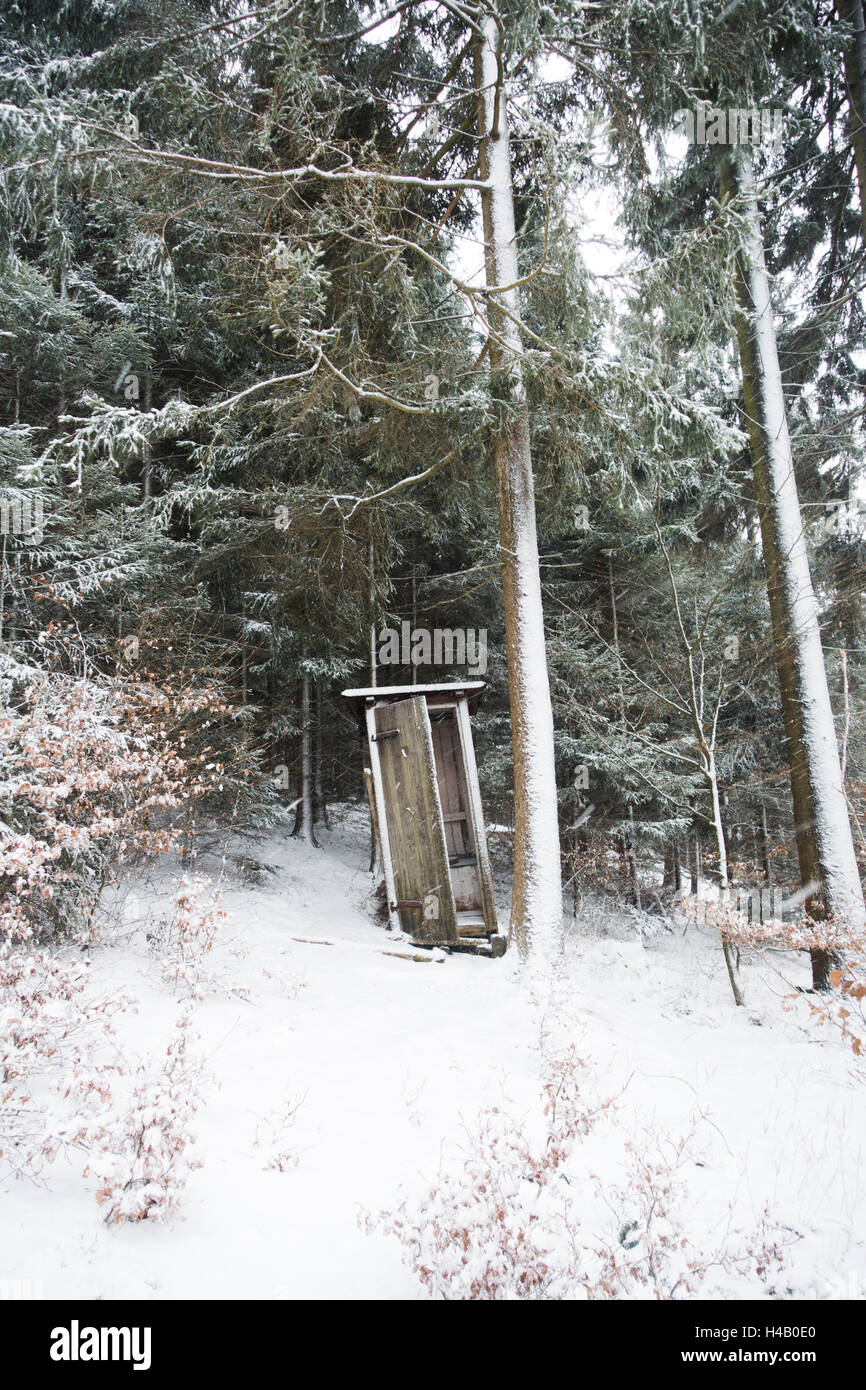Outhouse in the forest, snow Stock Photo