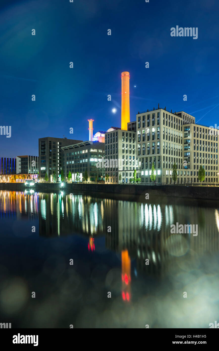 Germany, Hesse, Frankfurt on the Main, view at the office buildings in the Westhafen at dusk, Stock Photo